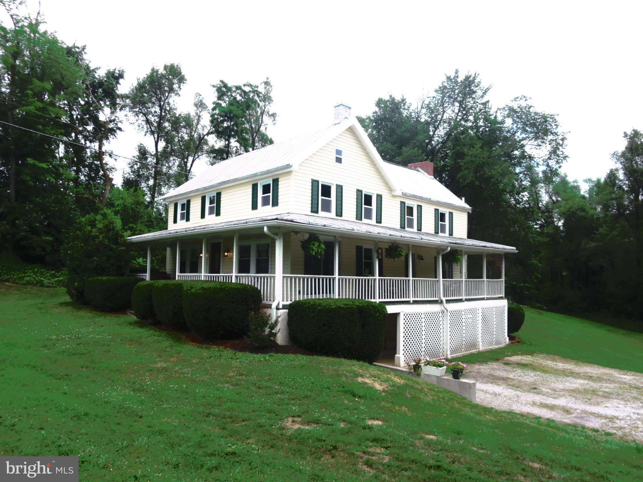 4166 Middleburg Road Union Bridge, MD 21791 - Photo 1 of 29 a view of a house with a yard and potted plants