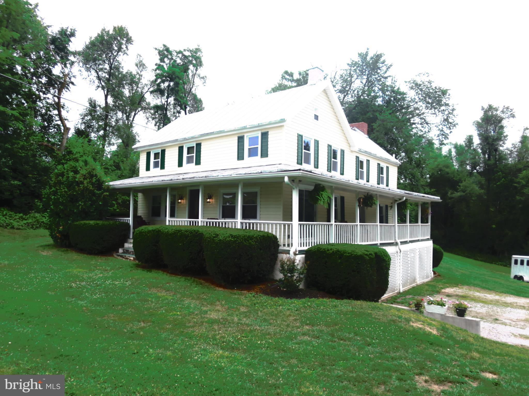 4166 Middleburg Road Union Bridge, MD 21791 - Photo 2 of 29 a front view of a house with a garden