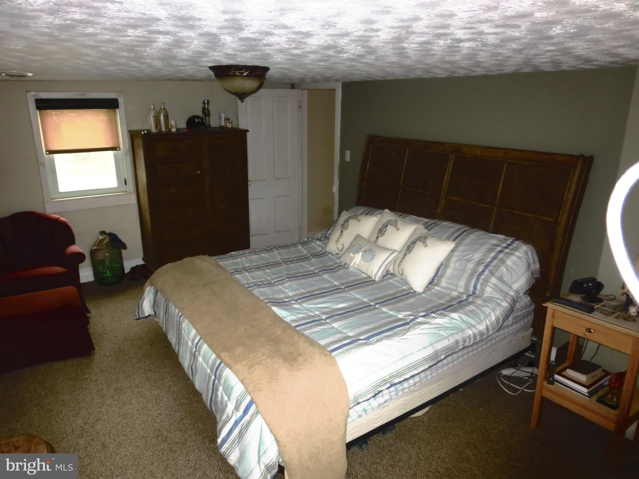 4166 Middleburg Road Union Bridge, MD 21791 - Photo 14 of 29 a bedroom with bed and window
