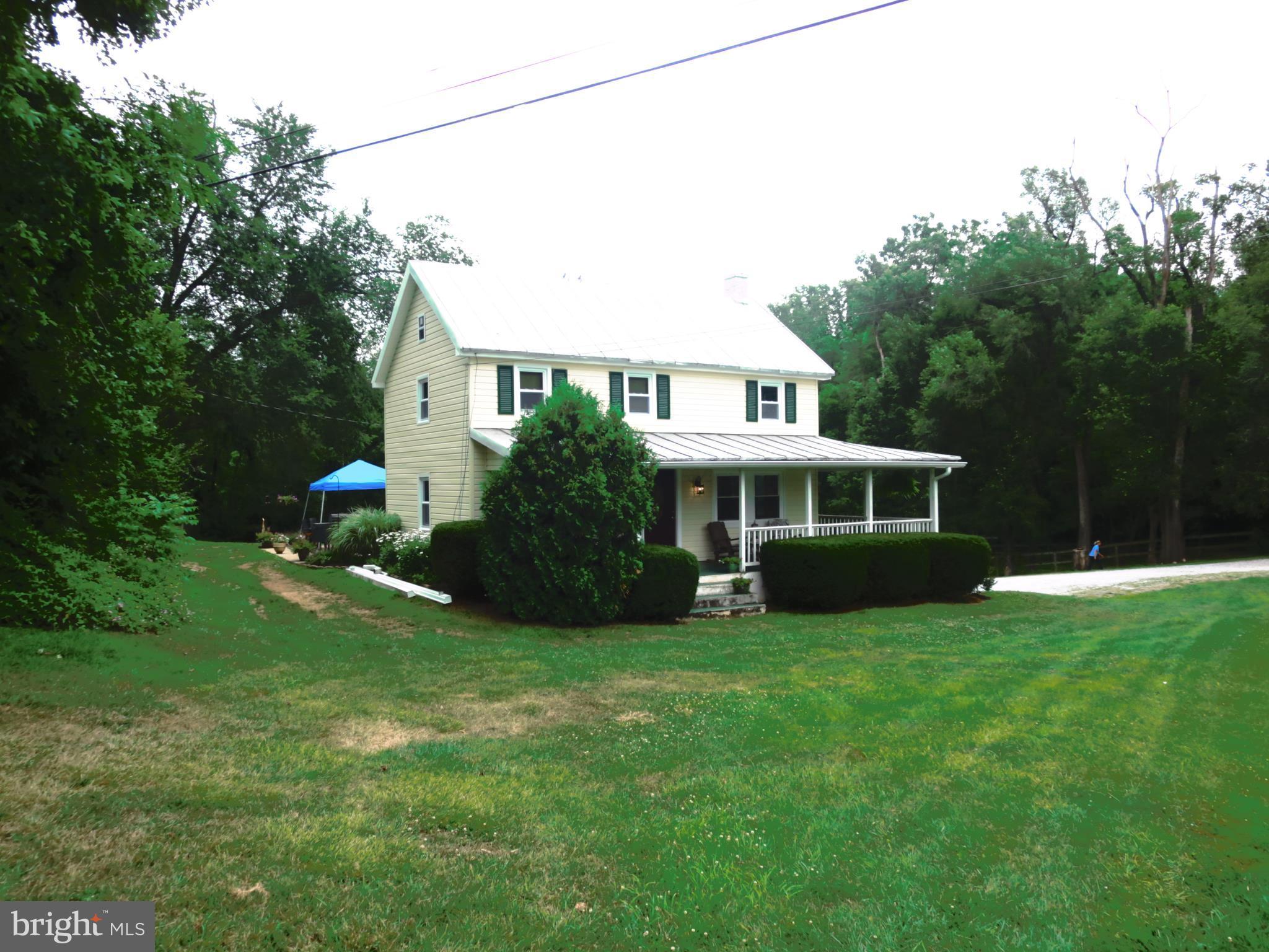 4166 Middleburg Road Union Bridge, MD 21791 - Photo 4 of 29 a view of a house with a yard and sitting area