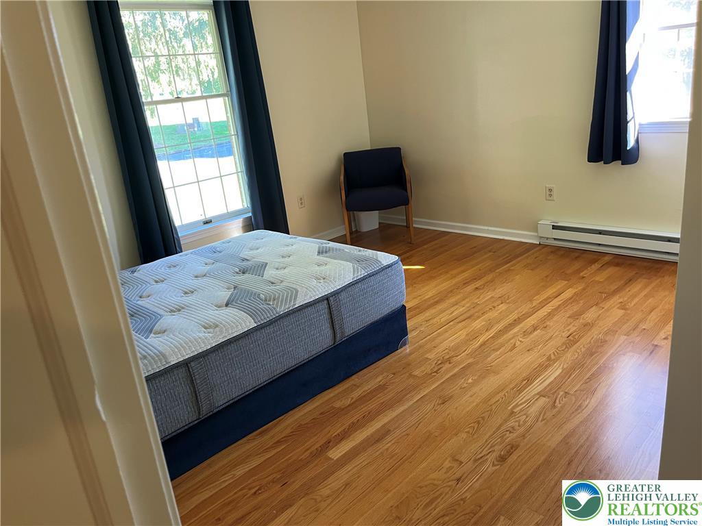 6221 Dove Drive Bethlehem, PA 18017 - Photo 26 of 38 Gleaming hardwood floors run throughout this inviting room lit by multiple windows.