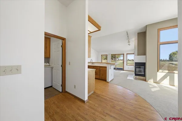 a view of an empty room with a window