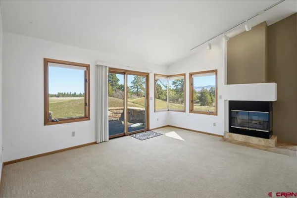 a large white room with a large window