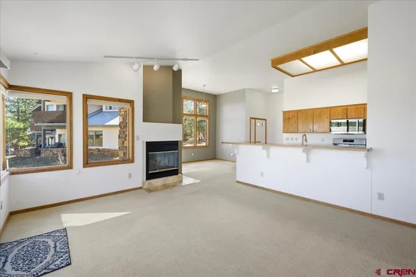 a view of a kitchen with a sink
