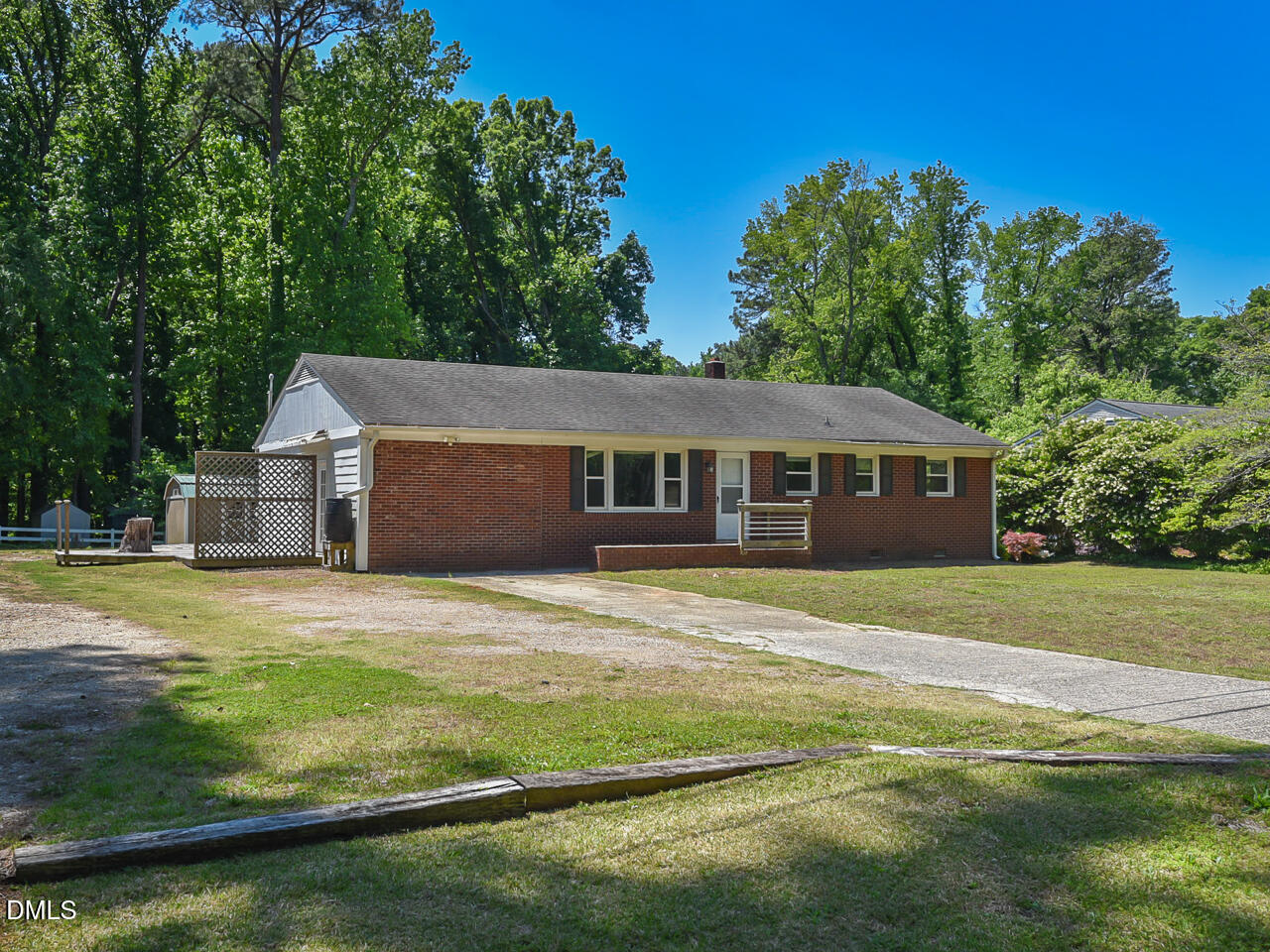 1703 St Patrick Drive Raleigh, NC 27603 - Photo 21 of 29 a front view of a house with a garden
