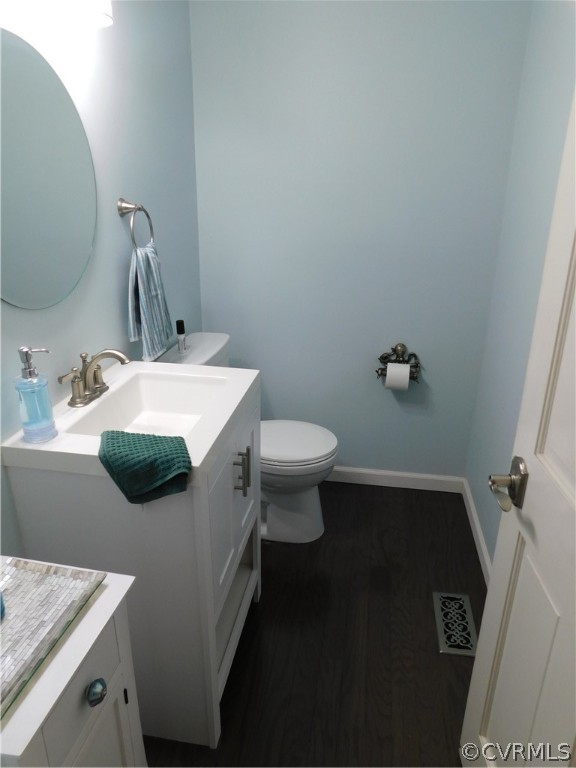 4410 Dunraven Road Chesterfield, VA 23236 - Photo 14 of 41 a bathroom with a sink and a mirror