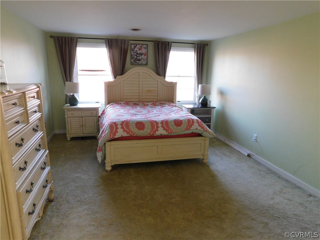 4410 Dunraven Road Chesterfield, VA 23236 - Photo 20 of 41 a bedroom with a bed and a window