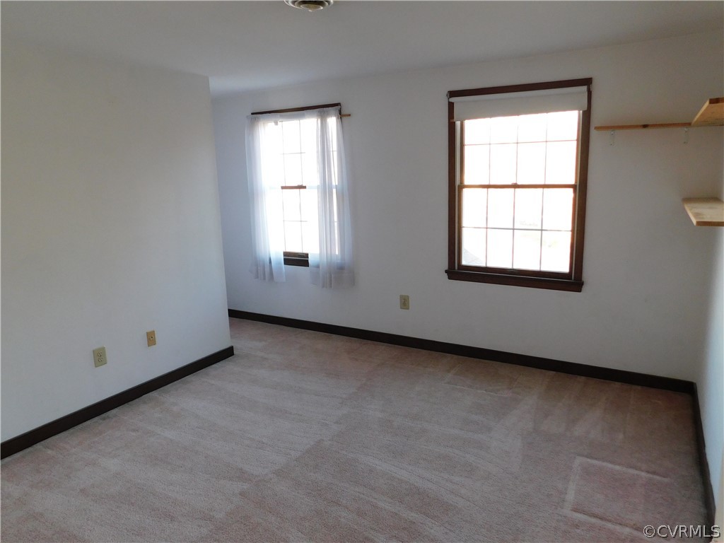 4410 Dunraven Road Chesterfield, VA 23236 - Photo 22 of 41 an empty room with a window