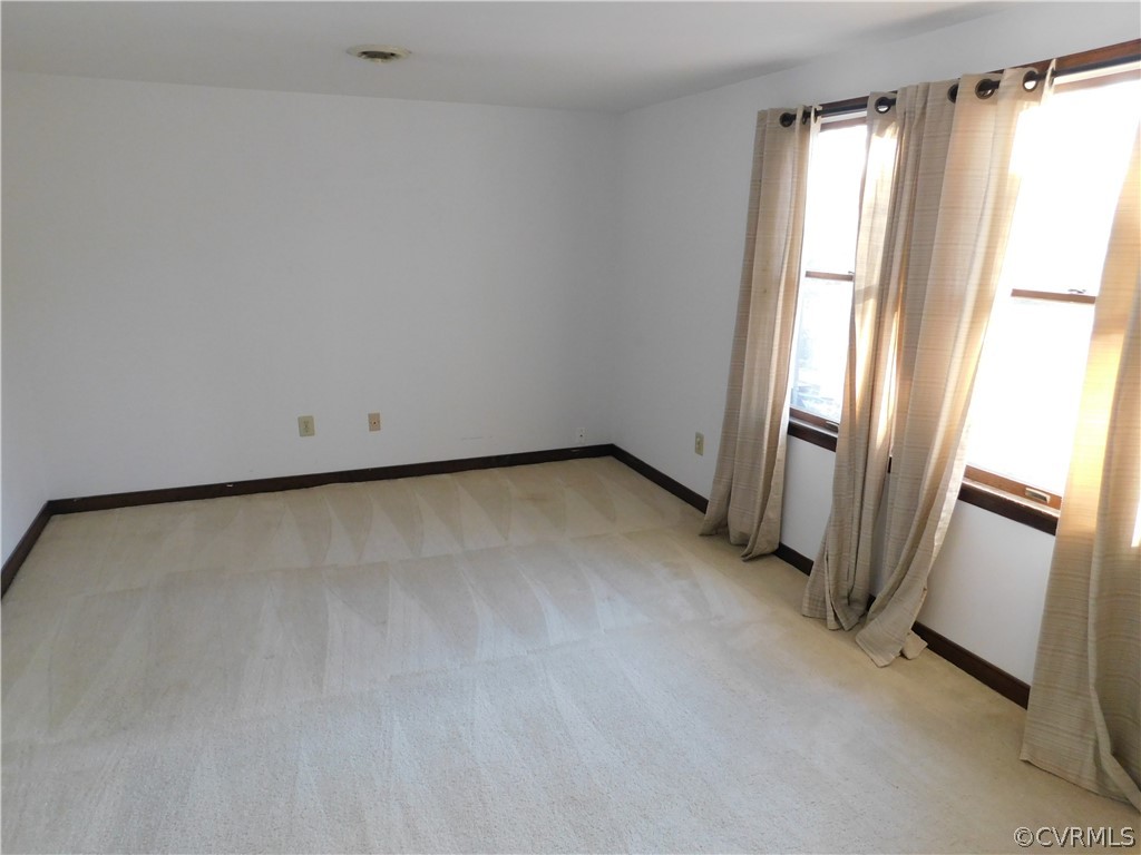 4410 Dunraven Road Chesterfield, VA 23236 - Photo 25 of 41 a view of an empty room with a window