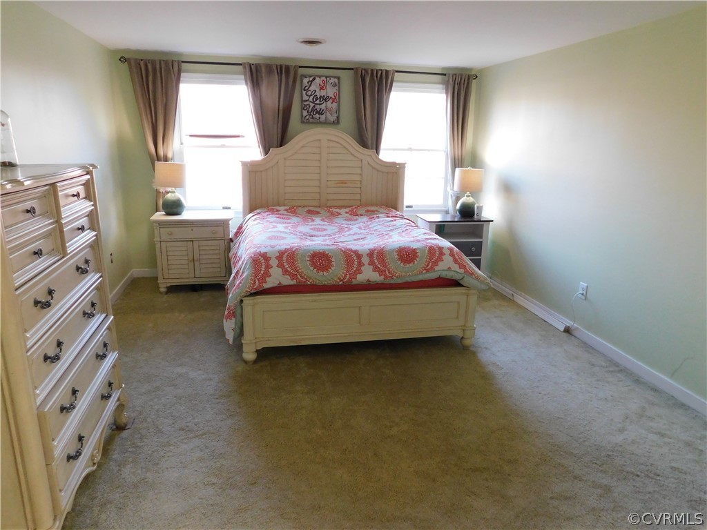 4410 Dunraven Road Chesterfield, VA 23236 - Photo 35 of 41 a bedroom with a bed and window