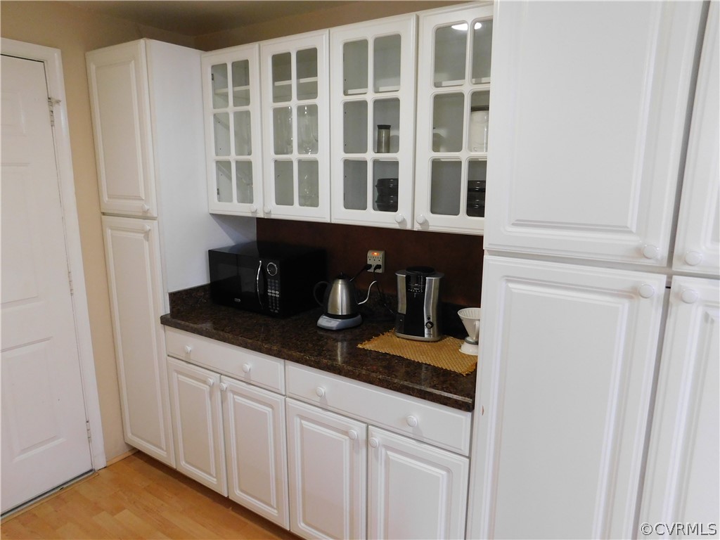 4410 Dunraven Road Chesterfield, VA 23236 - Photo 9 of 41 a kitchen with a sink and cabinets