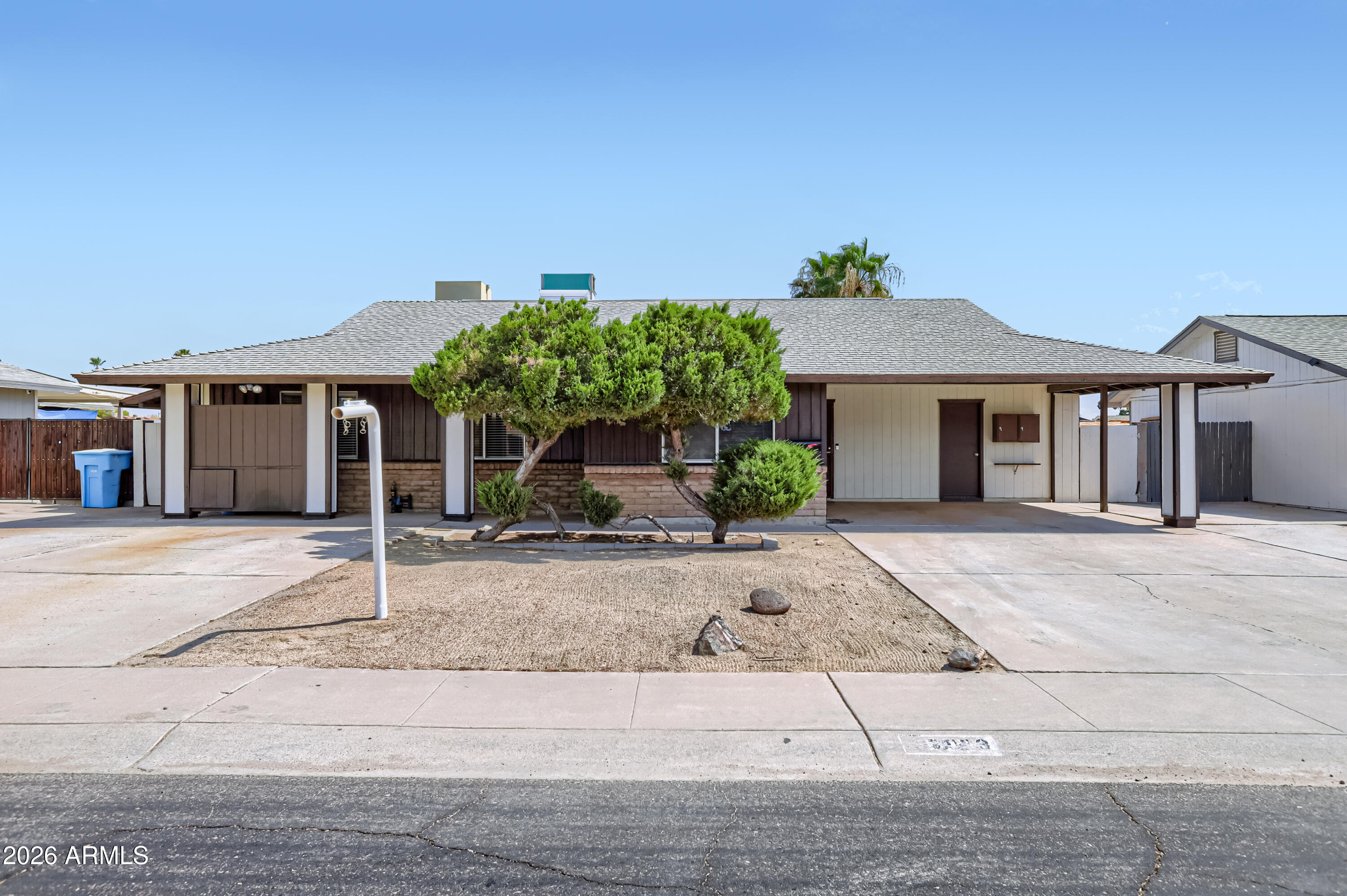 3823 West Greenway Road Phoenix, AZ 85053 - Photo 1 of 28 front view of a house with a yard