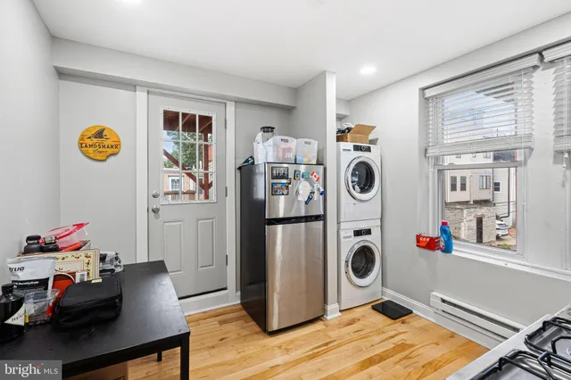 a room with furniture and a flat screen tv