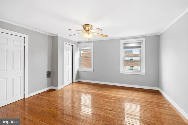 a view of a hallway with the hallway and closet