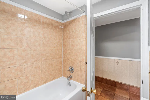 a bathroom with a sink toilet and mirror