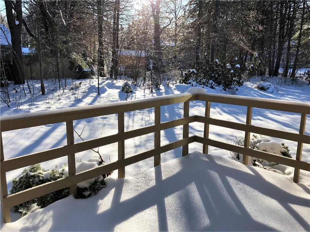 12 Brookmere Way, Unit 12 Brunswick, ME 04011 - Photo 23 of 26 Back deck overlooking wooded yard.