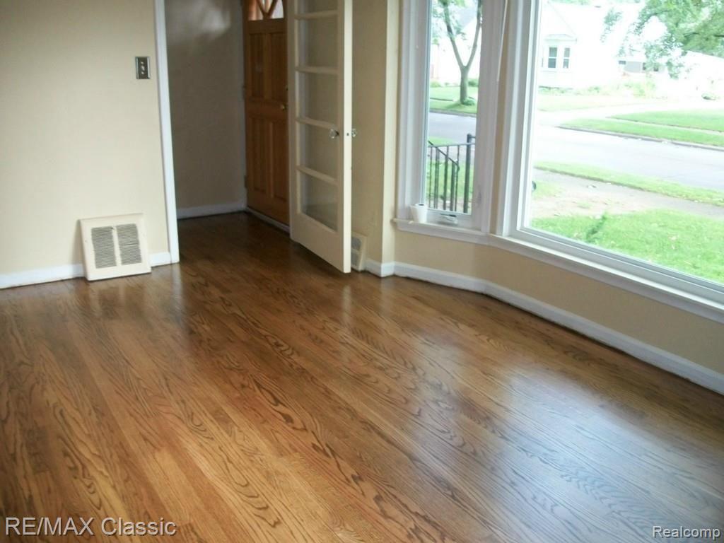 1259 Oxford Road Berkley, MI 48072 - Photo 17 of 30 Newly Refinish Hardwood floors.