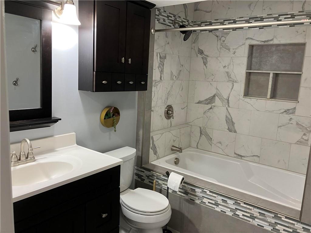 50 Village Road Slippery Rock, PA 16057 - Photo 11 of 26 a bathroom with a sink toilet and shower