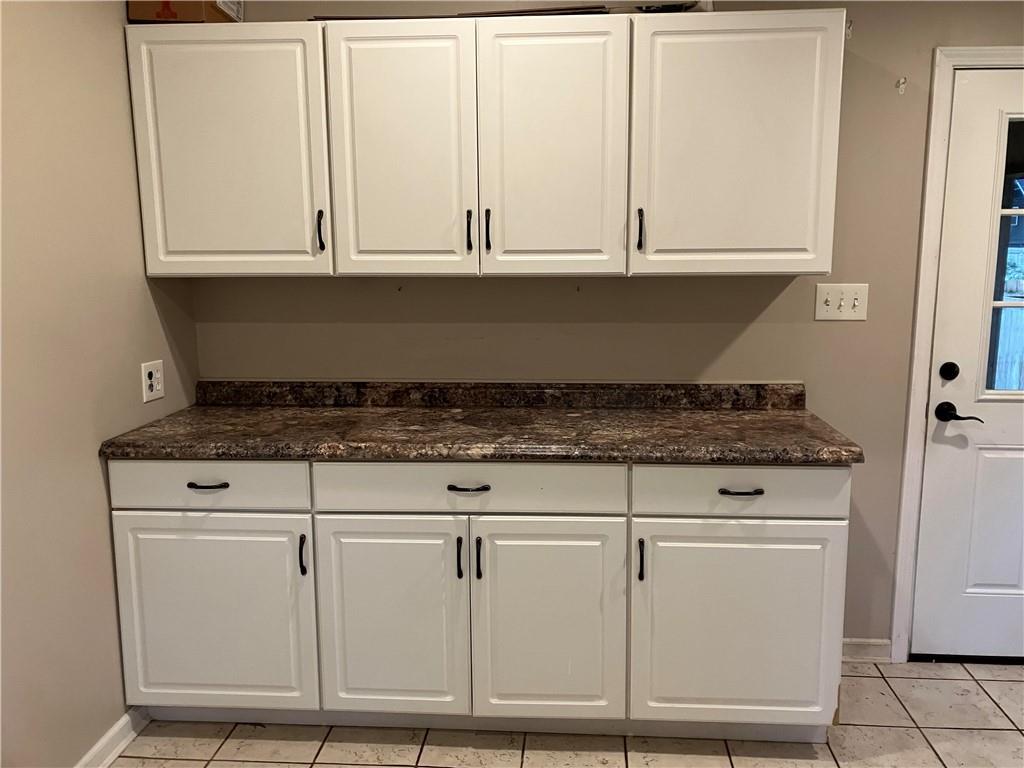 50 Village Road Slippery Rock, PA 16057 - Photo 14 of 26 a stove top oven sitting inside of a kitchen
