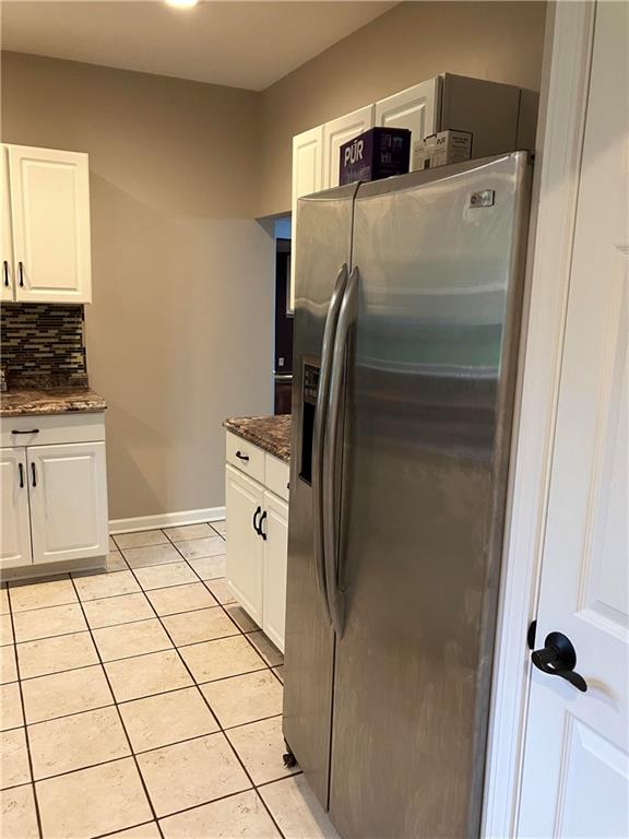50 Village Road Slippery Rock, PA 16057 - Photo 7 of 26 a close view of a refrigerator in kitchen and a refrigerator a sink