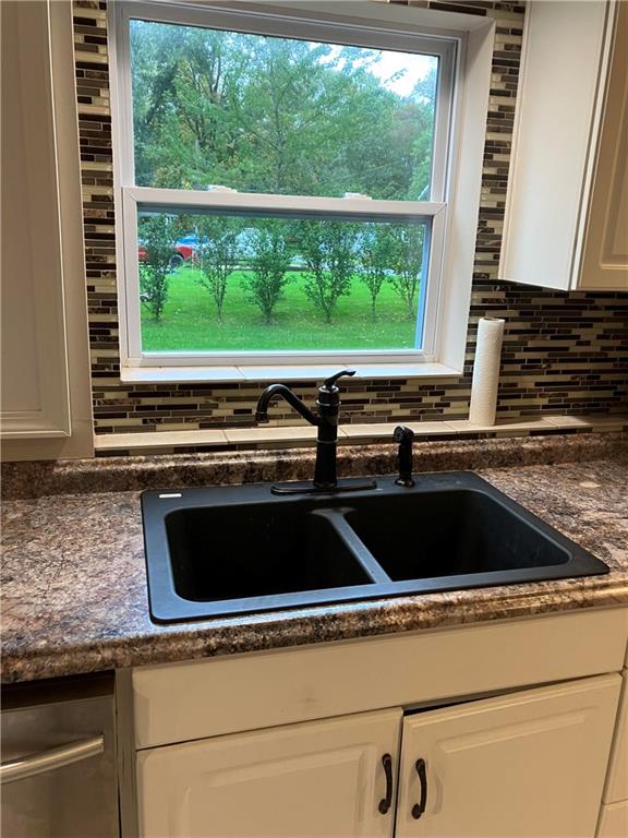 50 Village Road Slippery Rock, PA 16057 - Photo 8 of 26 a kitchen sink sitting next to a window