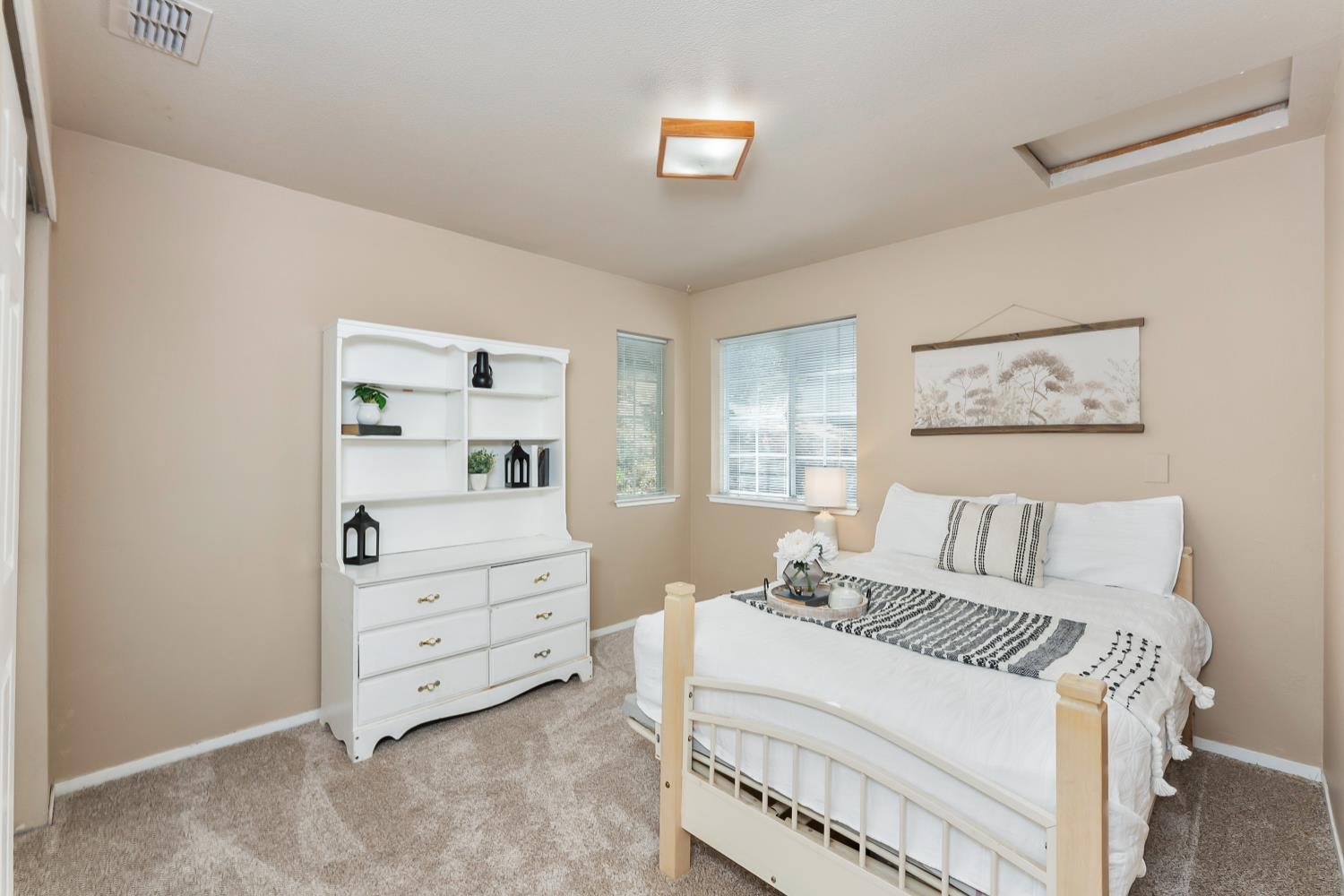 3472 See View Court Rescue, CA 95672 - Photo 27 of 56 a bedroom with a bed and a window