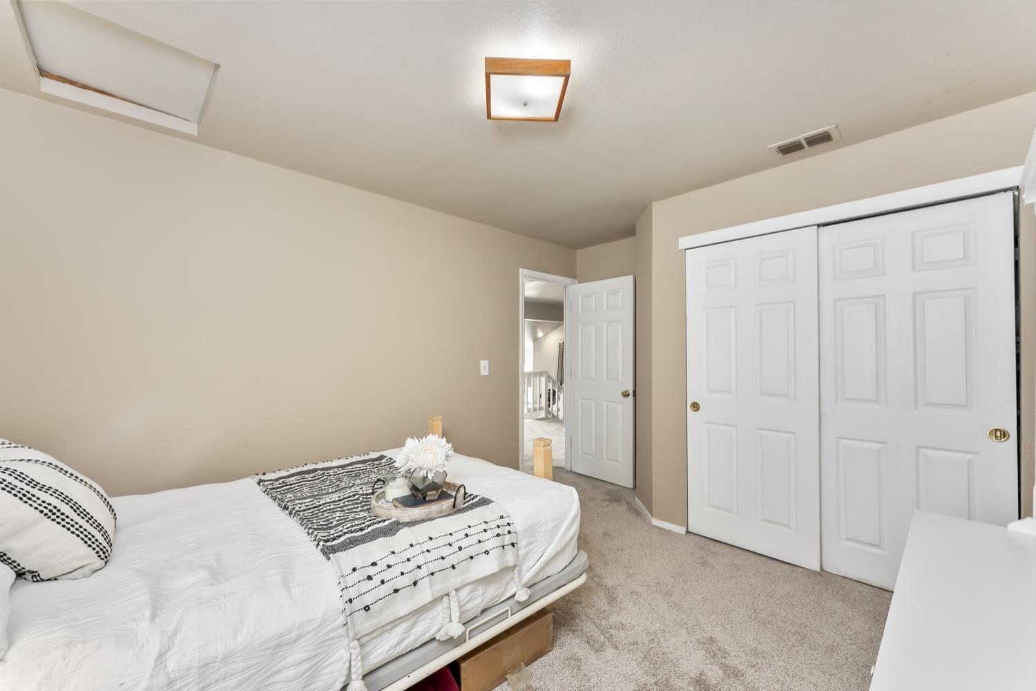 3472 See View Court Rescue, CA 95672 - Photo 28 of 56 a bedroom with a bed and a window