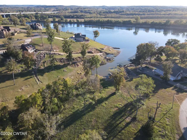 a view of a lake in middle of the town