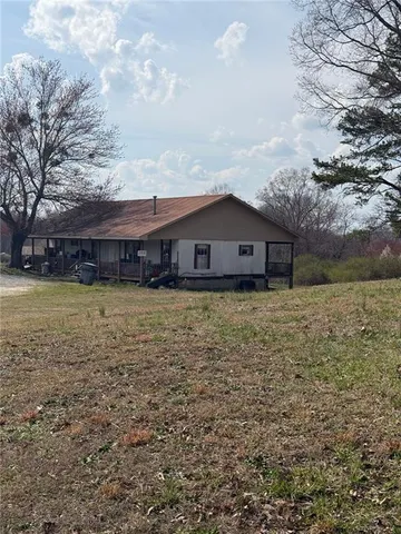 a house view with a garden space