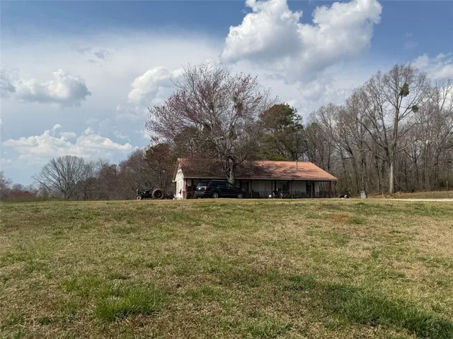 a fire hydrant in the middle of a field