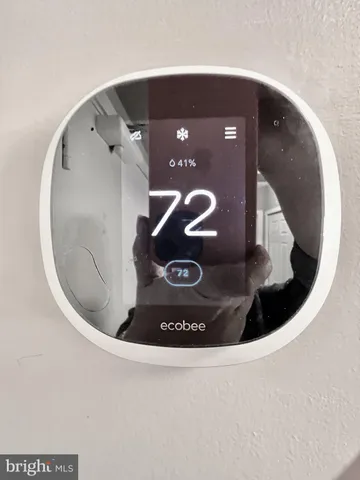 a view of swimming pool with outdoor seating