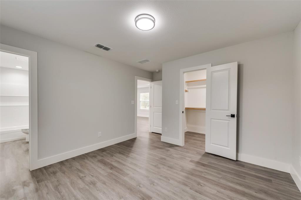 420 East 5th Street Bonham, TX 75418 - Photo 9 of 16 wooden floor in an empty room