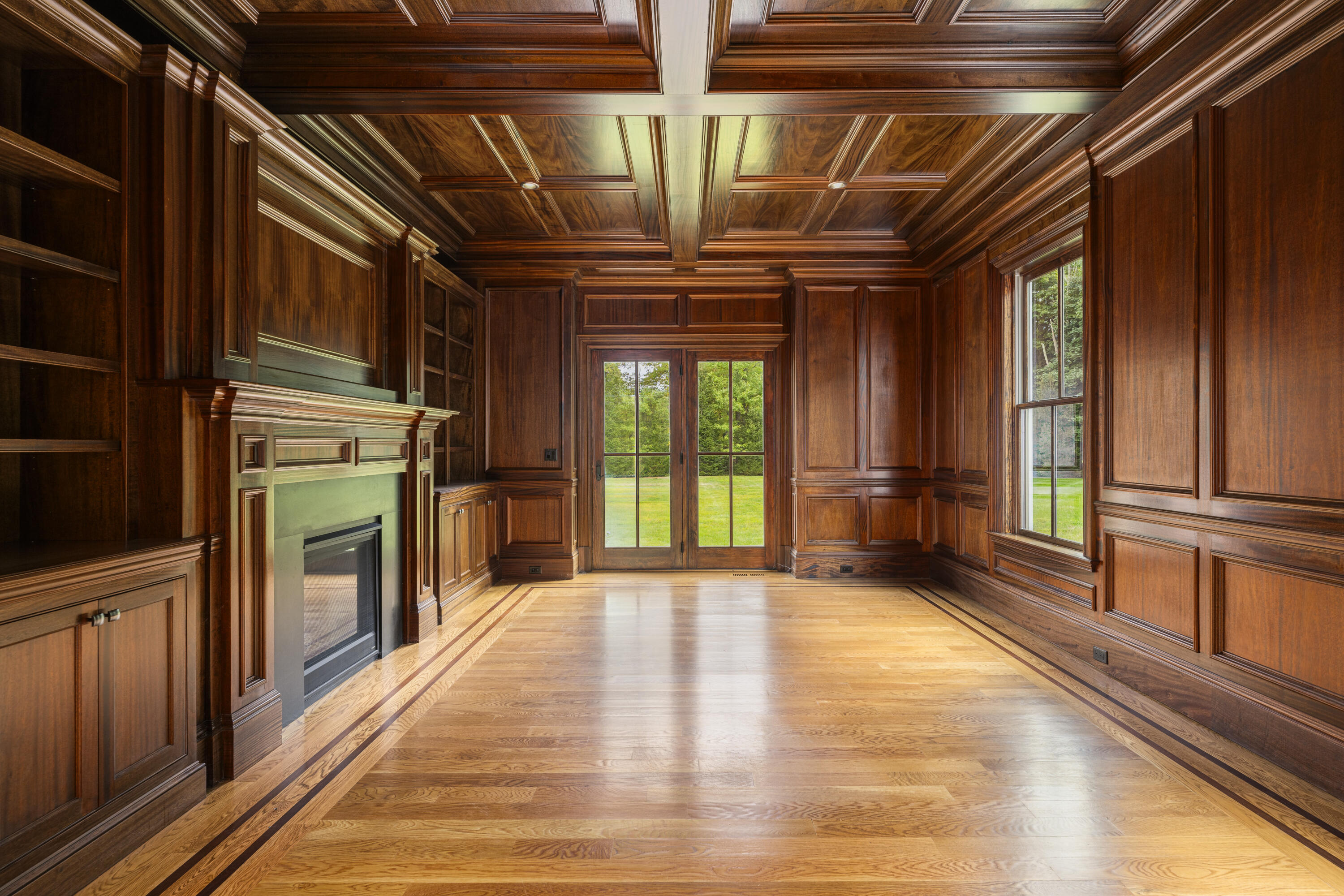 375 West Road New Canaan, CT 06840 - Photo 12 of 26 a view of an empty room with a fireplace