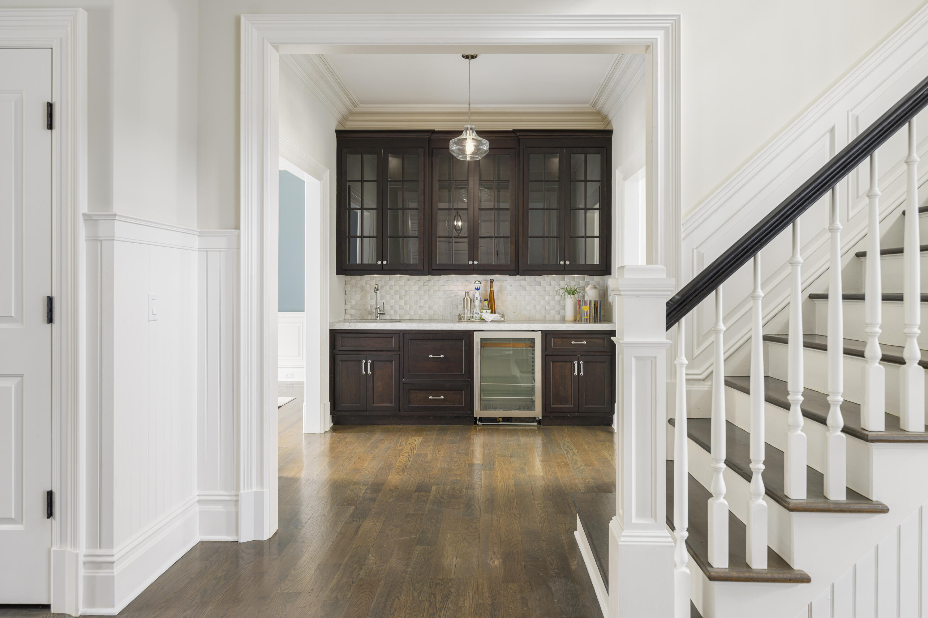 375 West Road New Canaan, CT 06840 - Photo 13 of 26 a view of a hallway with entryway wooden floor and front door