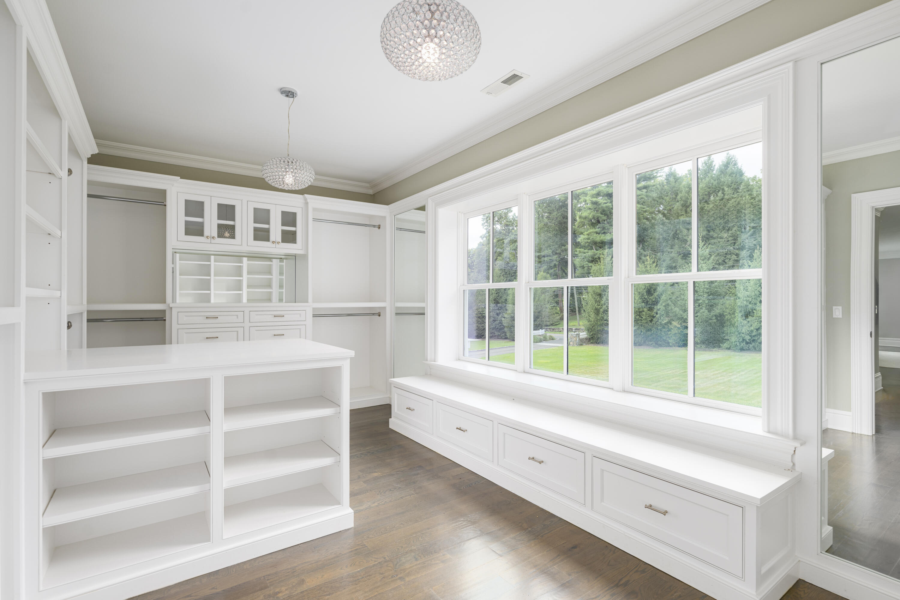 375 West Road New Canaan, CT 06840 - Photo 18 of 26 a view of walk in closet with empty racks