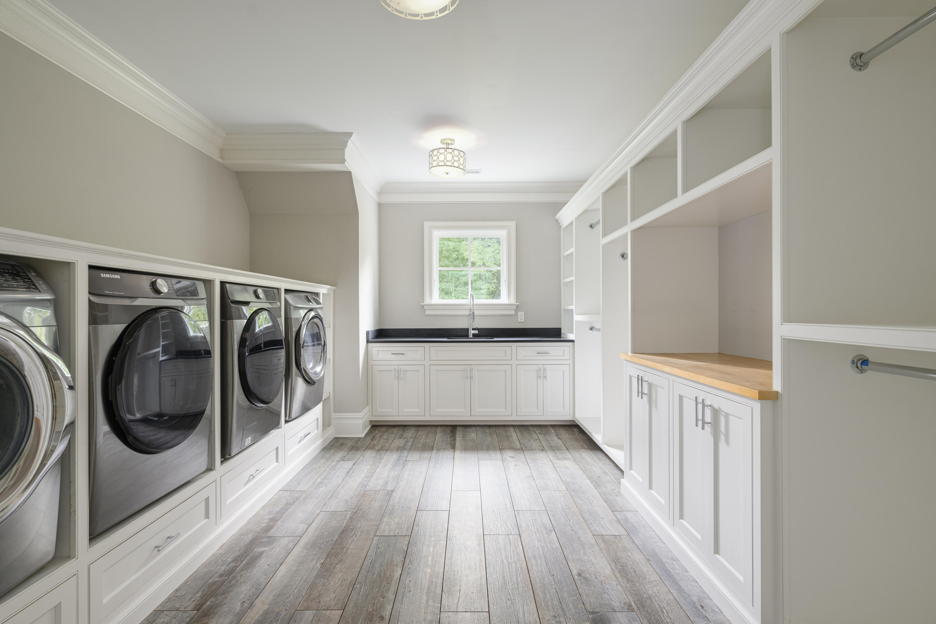 375 West Road New Canaan, CT 06840 - Photo 23 of 26 a view of a hallway with washer and dryer