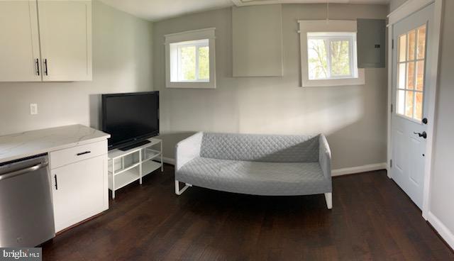 18812 Harmony Church Road Leesburg, VA 20175 - Photo 6 of 6 a living room with furniture and a flat screen tv