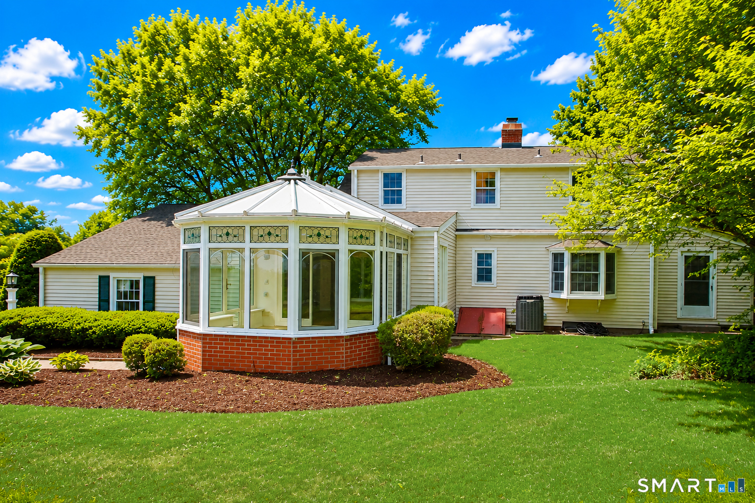 23 Norway Road North Haven, CT 06473 - Photo 4 of 32 a front view of a house with a garden and porch