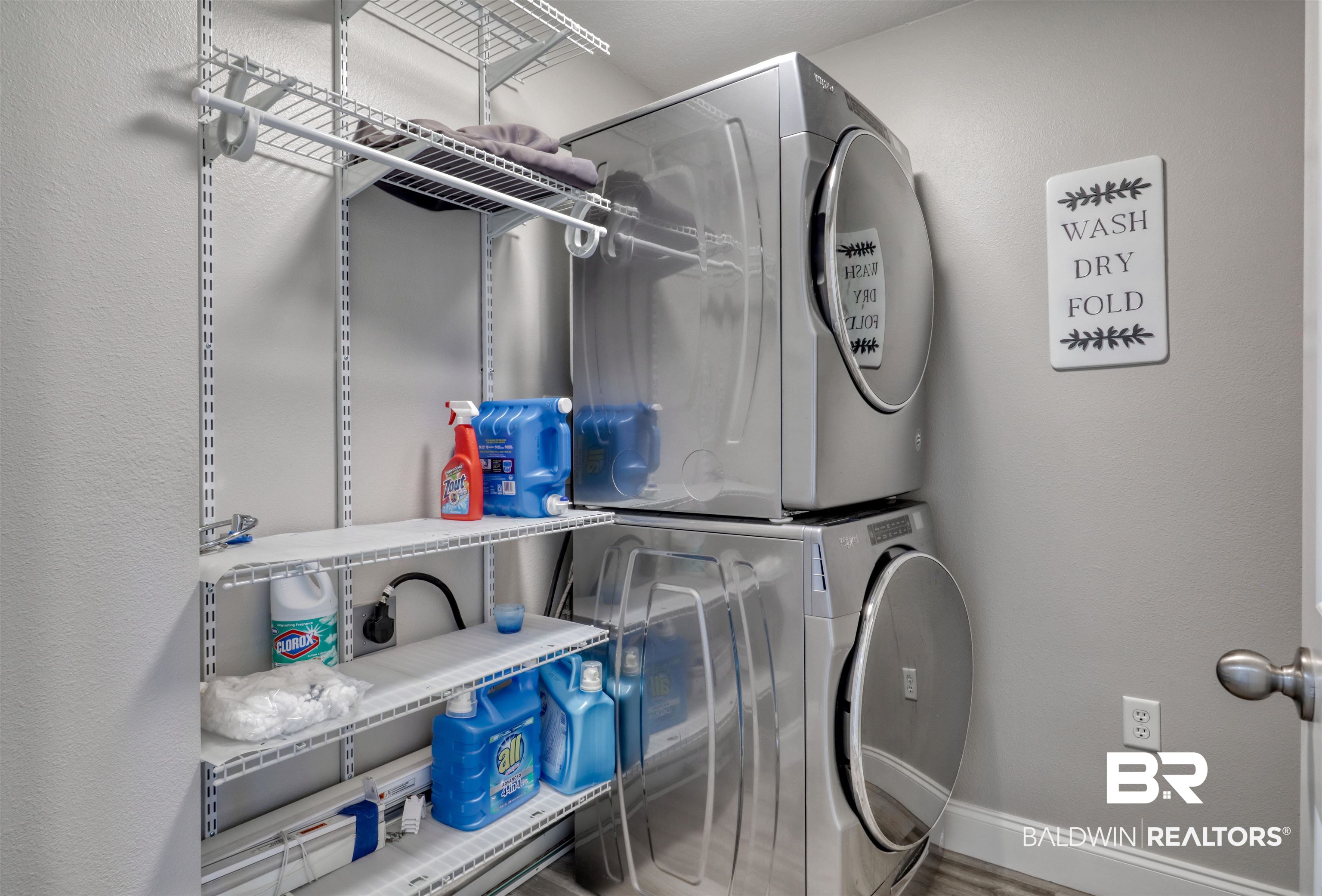 27800 Canal Road, Unit 403 & 404 Orange Beach, AL 36561 - Photo 20 of 39 Laundry area with stacked washer and clothes dryer
