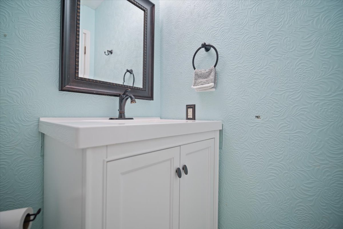 1707 King Drive, Unit D Normal, IL 61761 - Photo 15 of 24 a bathroom with a sink and a mirror