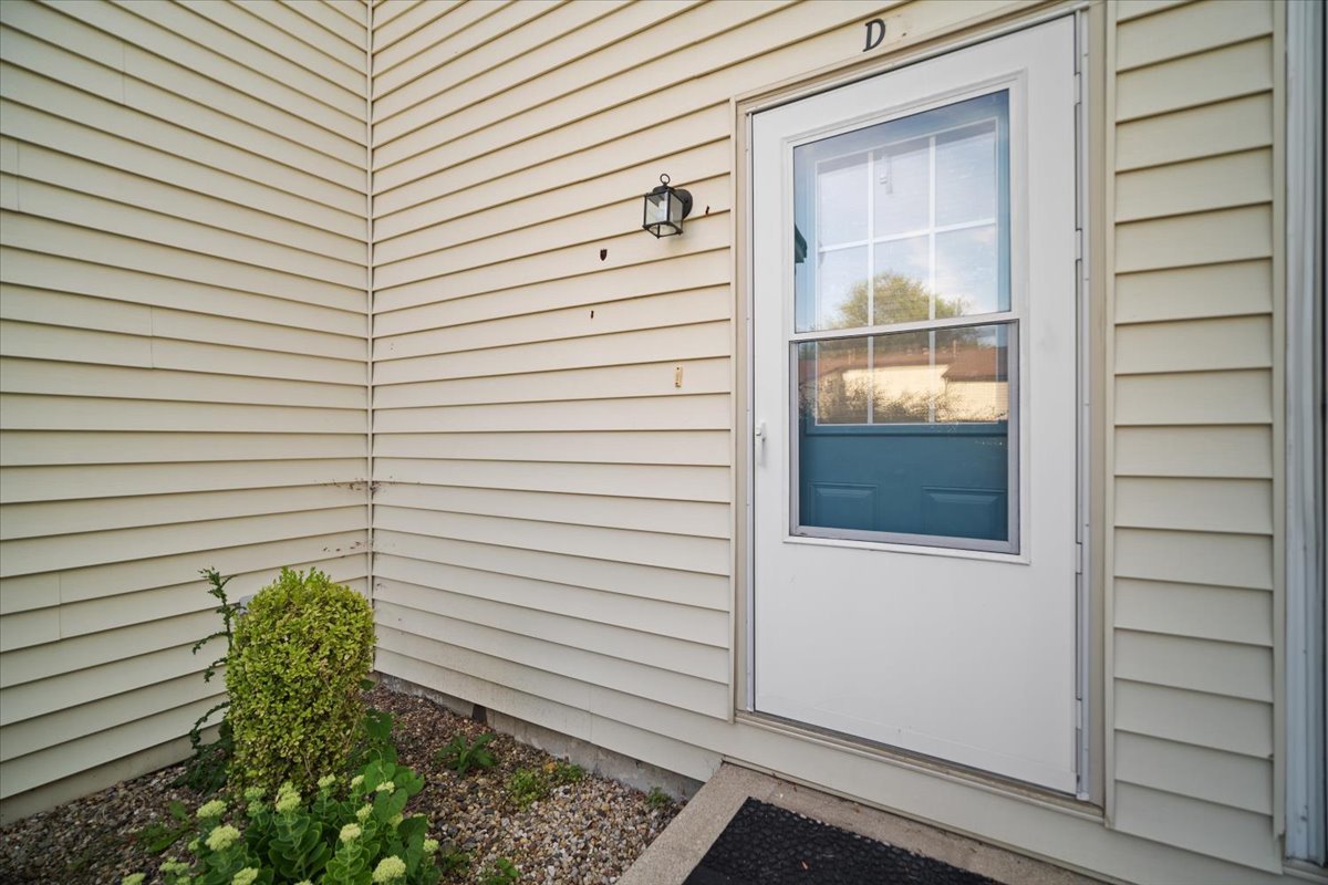 1707 King Drive, Unit D Normal, IL 61761 - Photo 3 of 24 a view of a door and a window