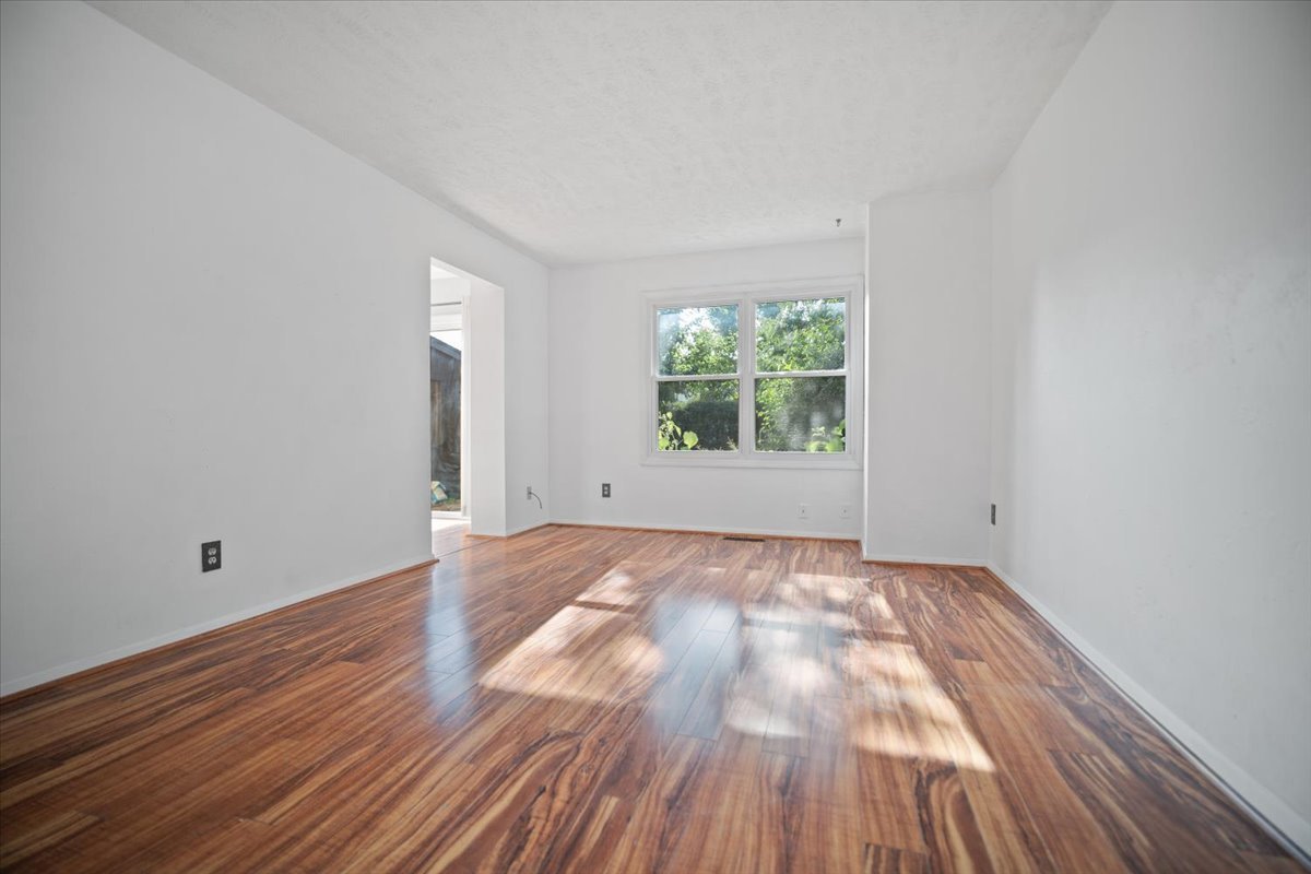 1707 King Drive, Unit D Normal, IL 61761 - Photo 5 of 24 an empty room with windows