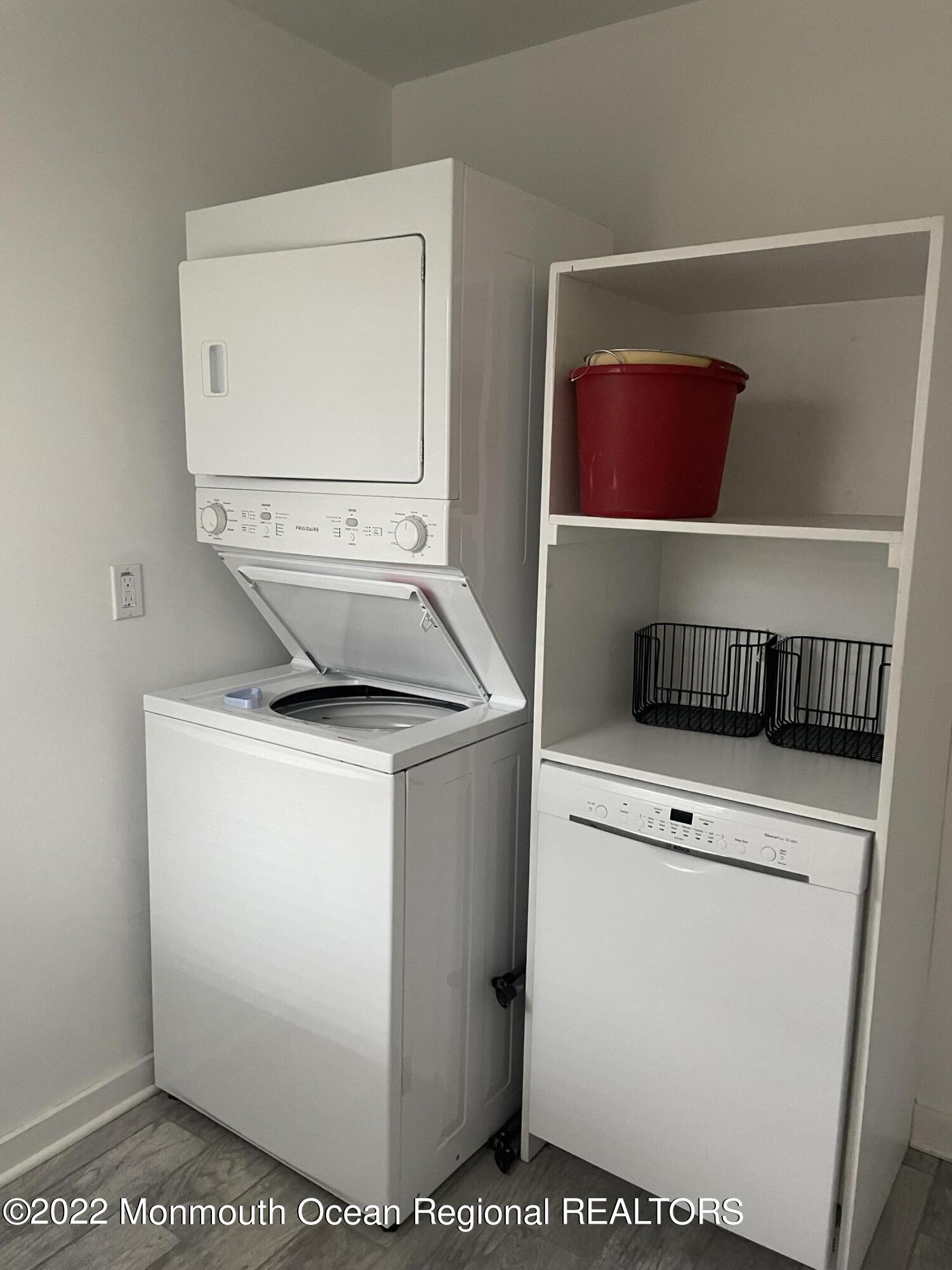 143 Mt Hermon Way, Unit 1/2 Ocean Grove, NJ 07756 - Photo 11 of 26 a utility room with dryer and washer