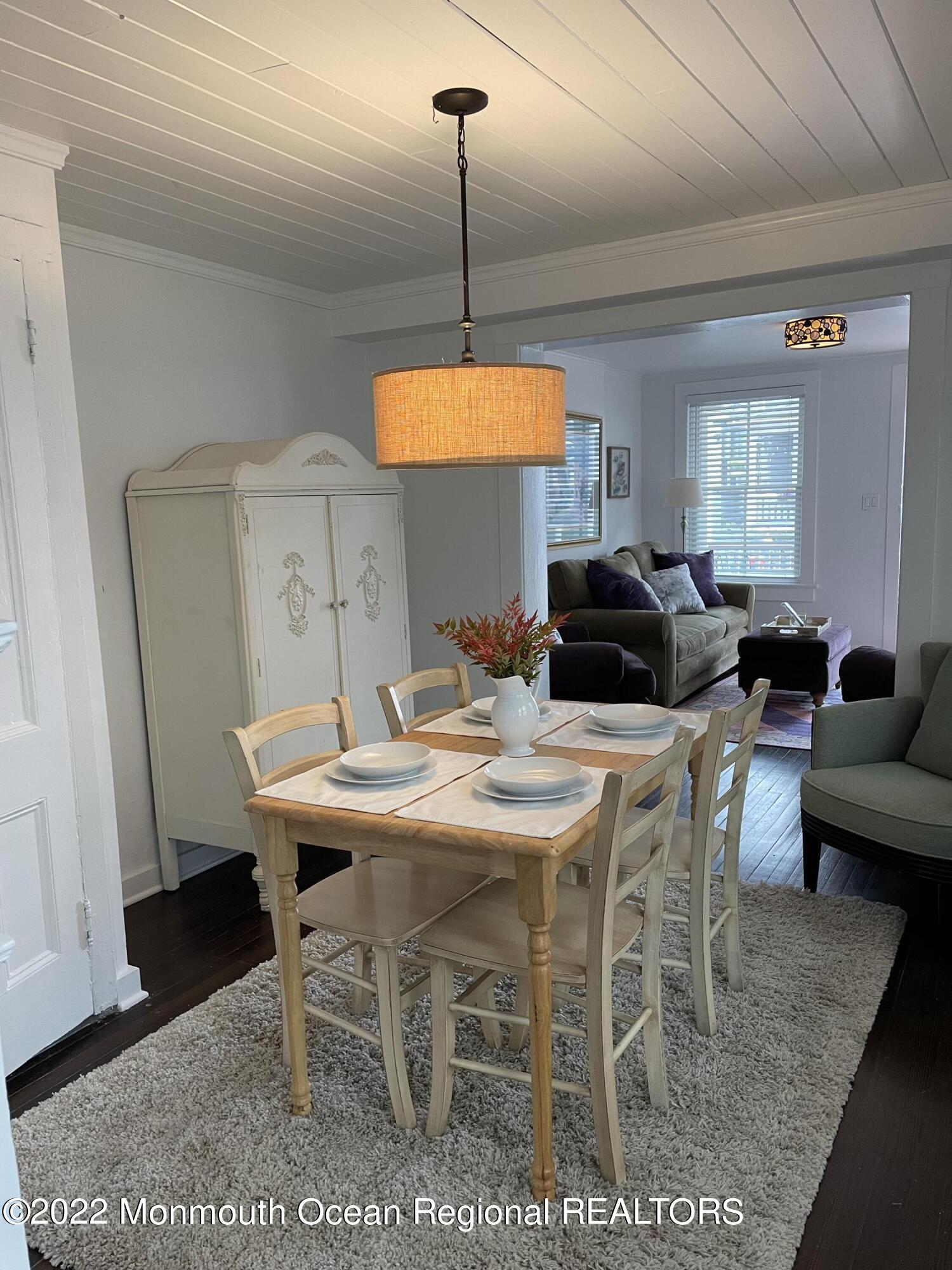143 Mt Hermon Way, Unit 1/2 Ocean Grove, NJ 07756 - Photo 8 of 26 a view of a dining room with furniture
