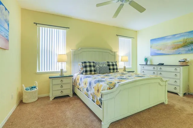 a bed room with a bed and a window