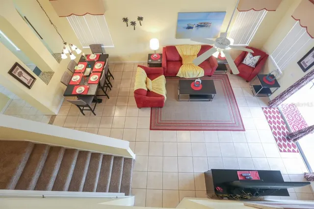 a bathroom with a sink mirror and window