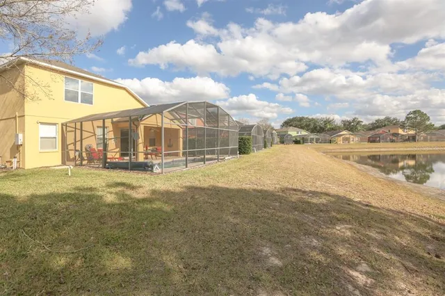 a view of a house with a swimming pool