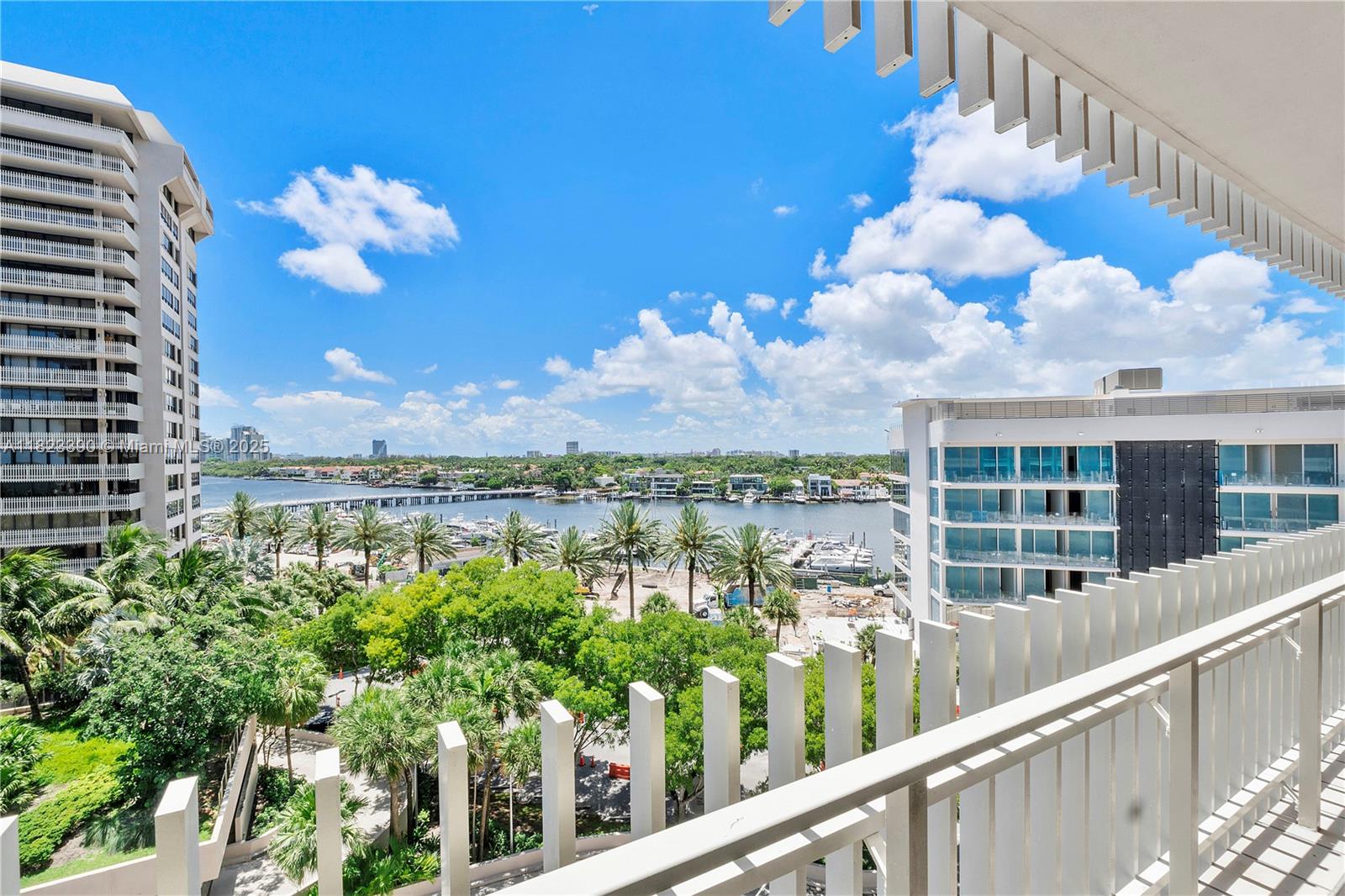 3 Grove Isle Drive, Unit C706 Miami, FL 33133 - Photo 19 of 20 a view of a lake from a balcony