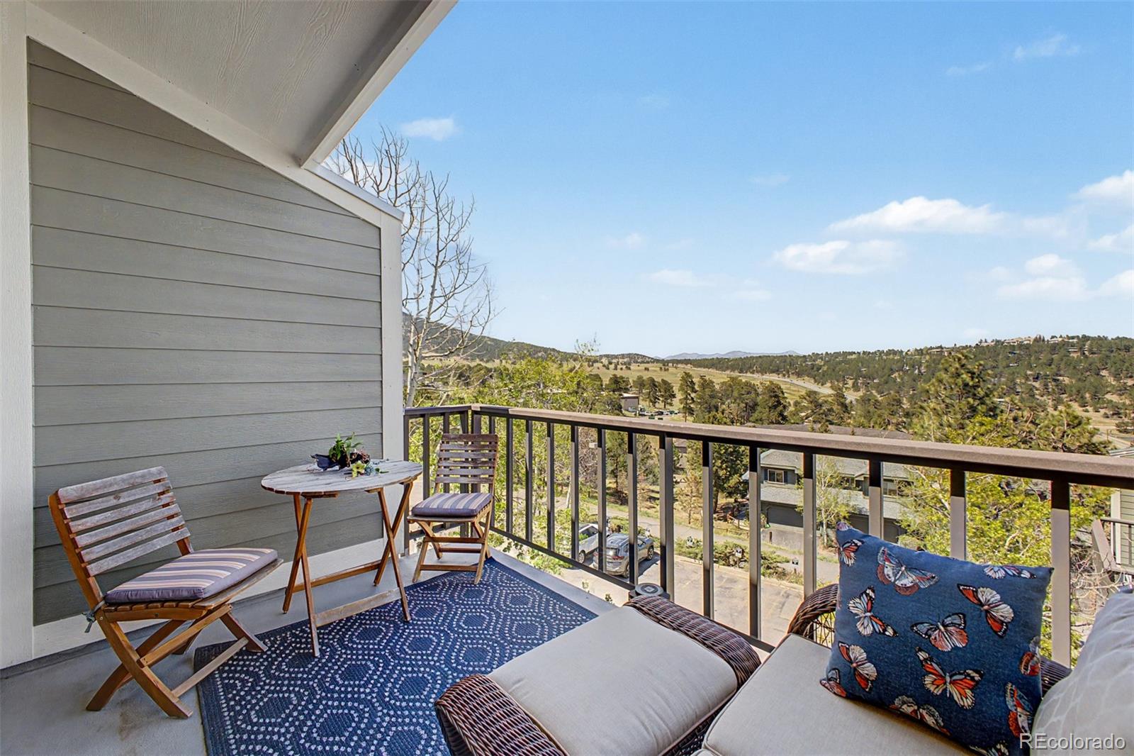 31270 John Wallace Road, Unit 412 Evergreen, CO 80439 - Photo 23 of 38 a view of a two chairs in the roof deck