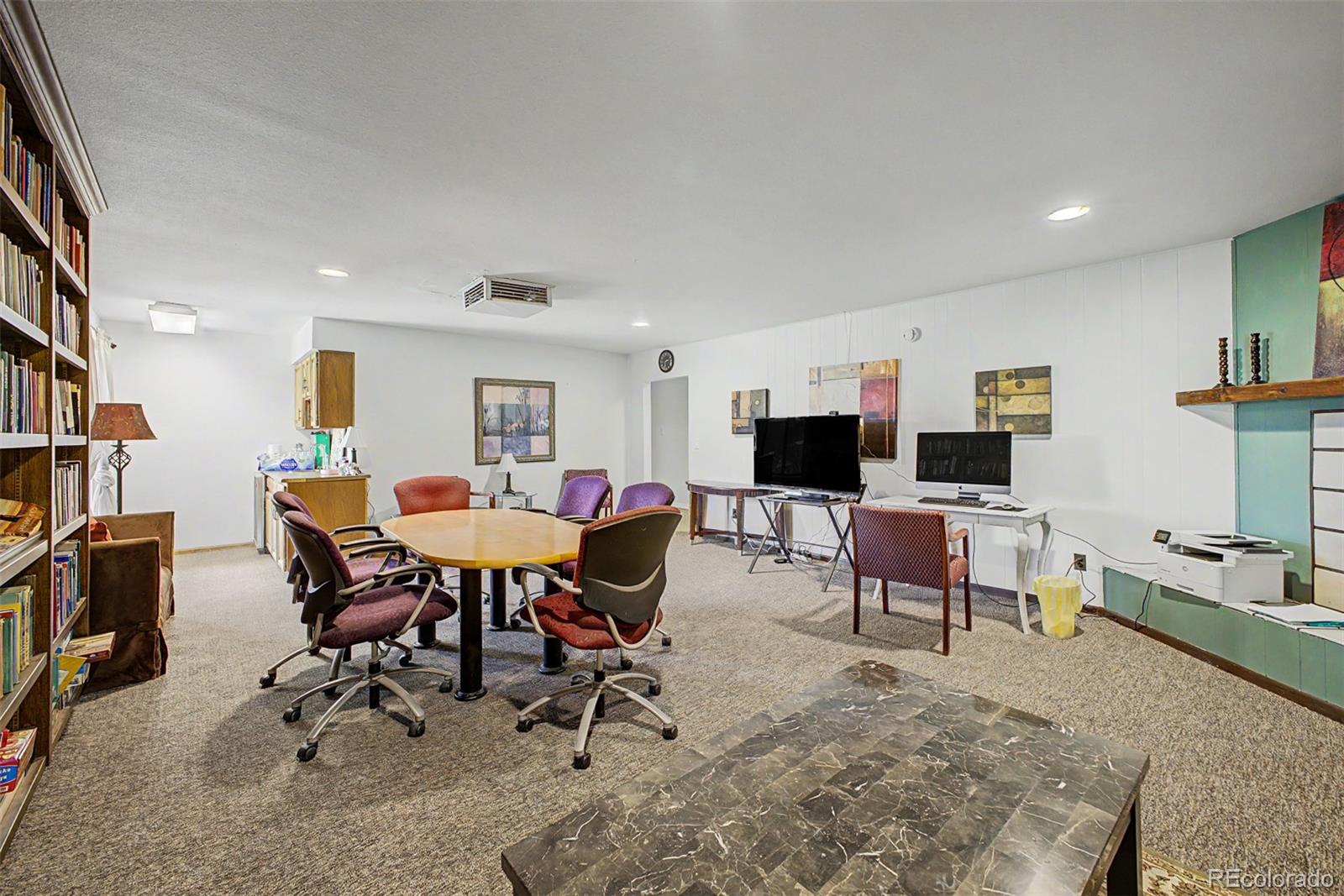 31270 John Wallace Road, Unit 412 Evergreen, CO 80439 - Photo 25 of 38 a view of a dining room with furniture